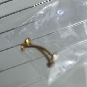 Stylish Gold piercings. Gold bar, and flexible pregnancy belly bars.